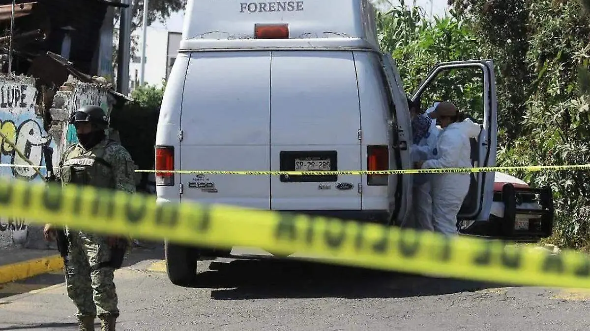 Hallan muerto a guardia de seguridad sobre vagón en Puebla